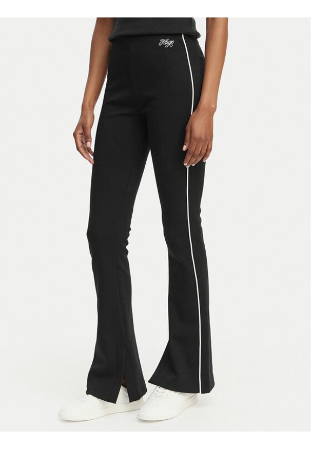 Hugo - HUGO Spodnie dresowe Niflack 50558616 Czarny Regular Fit. Kolor: czarny. Materiał: bawełna