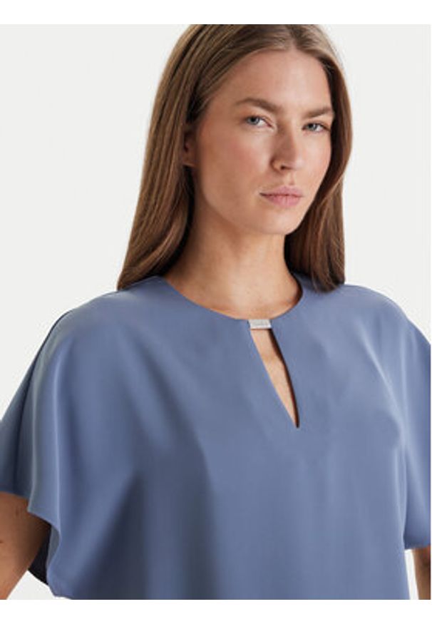 Calvin Klein Bluzka LV044E902G Błękitny Regular Fit. Kolor: niebieski. Materiał: syntetyk