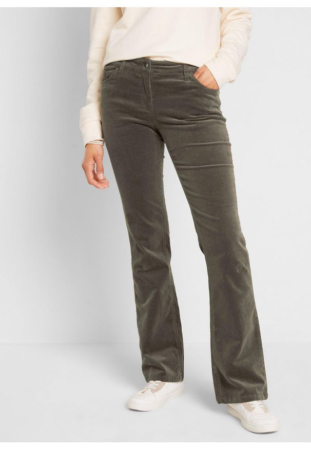 bonprix - Spodnie sztruksowe ze stretchem o kroju bootcut. Kolor: zielony. Materiał: sztruks