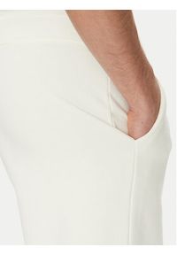 Tommy Jeans Spodnie dresowe Towel Patch DM0DM21277 Écru Regular Fit. Materiał: bawełna #5