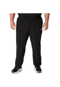 Spodnie dresowe Asics Core woven. Kolor: czarny. Materiał: dresówka. Sport: fitness