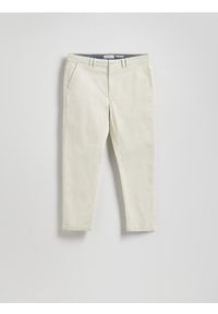 Reserved - Bawełniane spodnie chino slim - beżowy. Kolor: beżowy. Materiał: bawełna