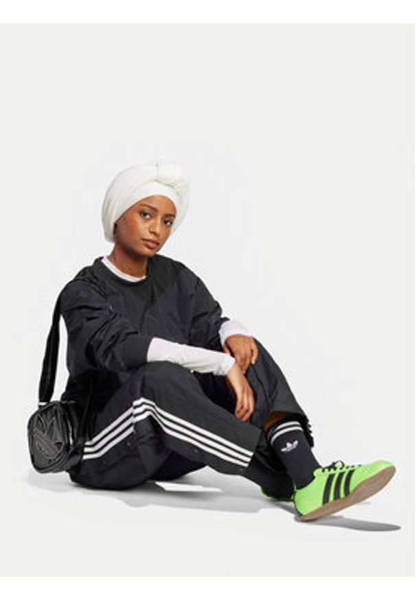 Adidas - adidas Spodnie dresowe adicolor Adibreak JD0857 Czarny Loose Fit. Kolor: czarny. Materiał: syntetyk