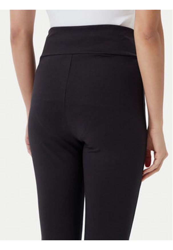 Puma Legginsy Ess 631542 Czarny Flared Fit. Kolor: czarny. Materiał: bawełna
