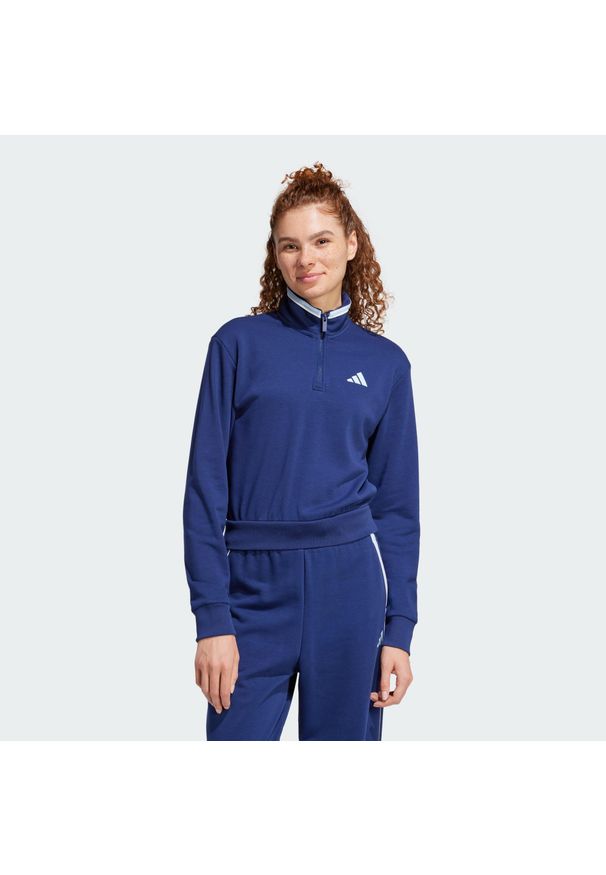 Adidas - Bluza dresowa Essentials Color Pop French Terry Crop Quarter-Zip. Kolor: niebieski. Materiał: dresówka. Długość rękawa: długi rękaw. Długość: krótkie. Sport: fitness
