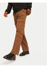 Jack & Jones - Jack&Jones Spodnie materiałowe Bill 12258307 Brązowy Relaxed Fit. Kolor: brązowy. Materiał: bawełna