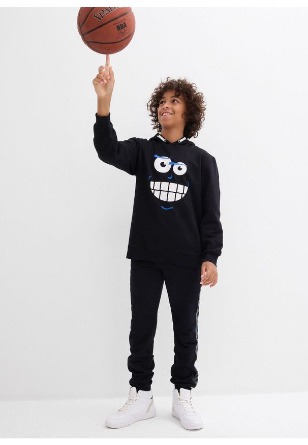 bonprix - Spodnie dresowe z bawełny organicznej. Kolor: czarny. Materiał: bawełna, dresówka