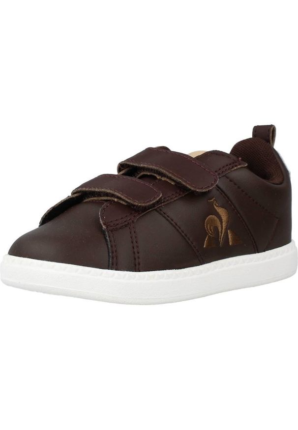 Le Coq Sportif - Kapcie LE COQ SPORTIF COURTCLASSIC INF Brązowy. Kolor: brązowy. Materiał: tkanina, skóra. Sport: turystyka piesza