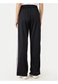 Adidas - adidas Spodnie dresowe adicolor Classic Firebird JC8245 Czarny Loose Fit. Kolor: czarny. Materiał: syntetyk #3