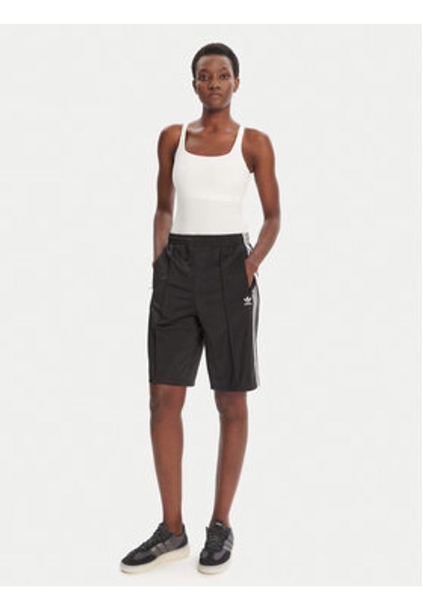 Adidas - adidas Szorty sportowe adicolor Firebird JD0286 Czarny Loose Fit. Kolor: czarny. Materiał: syntetyk