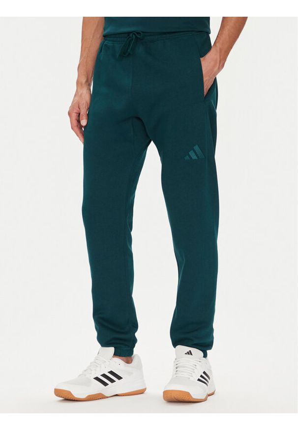 Adidas - adidas Spodnie dresowe ALL SZN Fleece JX5096 Zielony Tapered Leg. Kolor: zielony. Materiał: bawełna