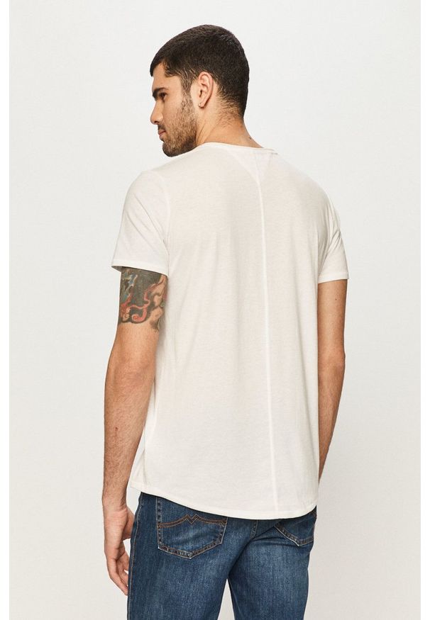 Tommy Jeans - T-shirt. Okazja: na co dzień. Kolor: biały. Materiał: dzianina. Styl: casual