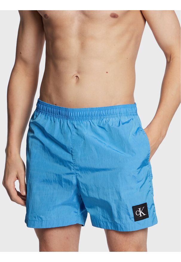 Calvin Klein Swimwear Szorty kąpielowe KM0KM00819 Niebieski Regular Fit. Kolor: niebieski. Materiał: syntetyk