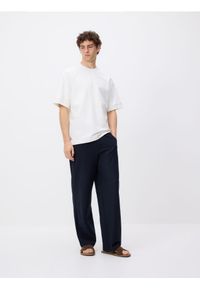 Reserved - Spodnie wide leg z wiązaniem - granatowy. Kolor: niebieski. Materiał: bawełna, dzianina