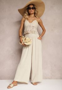 Renee - Beżowe Spodnie High Waist z Szerokimi Nogawkami i Gumką w Pasie Risabessa. Okazja: na co dzień. Stan: podwyższony. Kolor: beżowy. Styl: elegancki, casual
