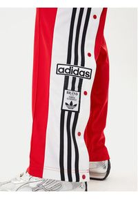 Adidas - adidas Spodnie dresowe Adibreak JY1354 Czerwony Loose Fit. Kolor: czerwony. Materiał: syntetyk #5