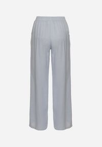 Born2be - Niebieskie Szerokie Spodnie z Lnem z Gumką w Talii i Kieszeniami Filisela. Okazja: na co dzień, do pracy. Kolor: niebieski. Materiał: len. Styl: elegancki, casual