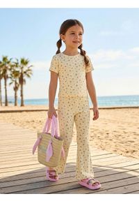 Sinsay - Bawełniane legginsy flare z motywem kwiatowym - żółty. Kolor: żółty. Materiał: bawełna. Wzór: kwiaty #1