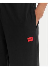 Hugo - HUGO Spodnie dresowe Signature 50556808 Czarny Regular Fit. Kolor: czarny. Materiał: bawełna #3
