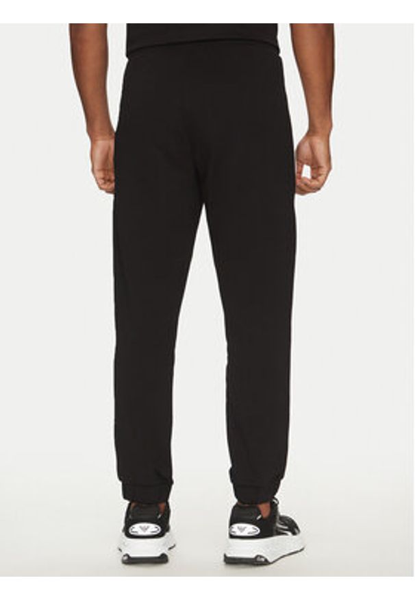 EA7 Emporio Armani Spodnie dresowe 7M000274 AF12451 UC001 Czarny Regular Fit. Kolor: czarny. Materiał: bawełna
