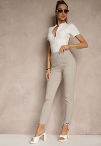 Renee - Beżowe Spodnie z Wiskozą High Waist i Ozdobnymi Napami Redaira. Okazja: na co dzień. Stan: podwyższony. Kolor: beżowy. Materiał: wiskoza. Wzór: aplikacja. Styl: sportowy, elegancki, casual