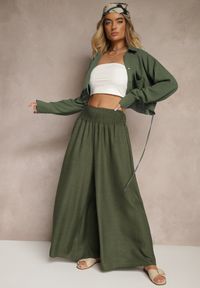 Renee - Ciemnozielone Szerokie Spodnie High Waist z Szeroką Gumą w Pasie Korissele. Okazja: na co dzień. Stan: podwyższony. Kolor: zielony. Materiał: guma. Wzór: aplikacja. Styl: elegancki, casual #4