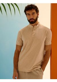 Sinsay - Bawełniana koszulka polo - kremowy. Typ kołnierza: polo. Kolor: kremowy. Materiał: bawełna