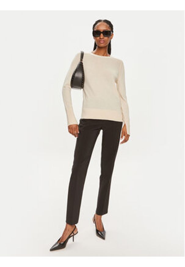 Calvin Klein Sweter K20K207575 Beżowy Regular Fit. Kolor: beżowy. Materiał: wełna