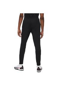 Nike - Męskie Spodnie Do Biegania Academy DriFIT. Kolor: czarny. Materiał: dresówka