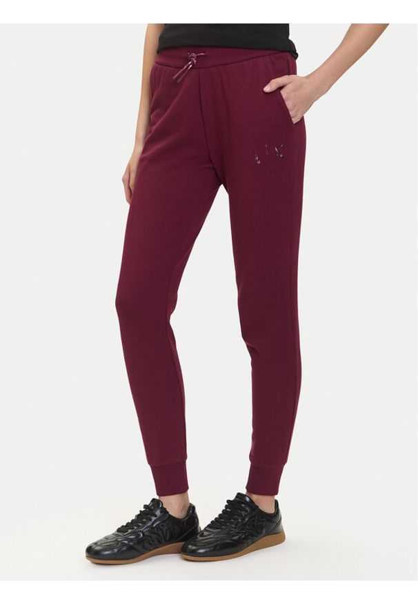 Armani Exchange Spodnie dresowe XW000986 AF16114 UA343 Bordowy Relaxed Fit. Kolor: czerwony. Materiał: bawełna