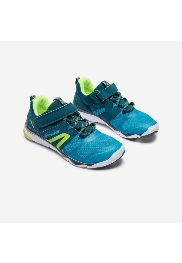 Decathlon - Buty sportowe dla dzieci Newfeel PW 540 JR. Zapięcie: rzepy. Kolor: żółty, wielokolorowy, niebieski, zielony. Materiał: materiał, kauczuk, tkanina