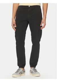 Tommy Jeans Joggery Ryan DM0DM20284 Czarny Regular Fit. Kolor: czarny. Materiał: bawełna