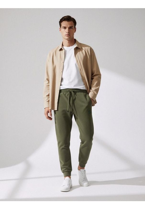 Sinsay - Spodnie jogger - zielony. Kolor: zielony