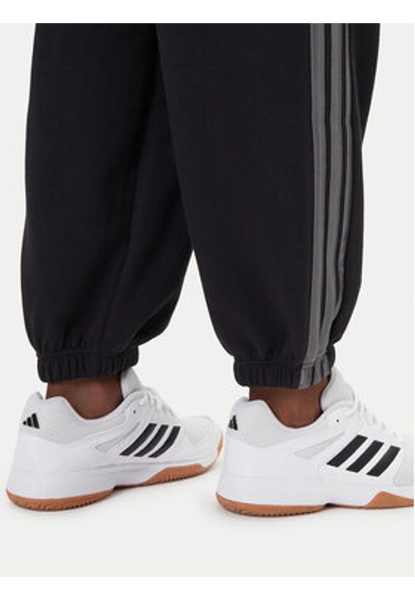 Adidas - adidas Spodnie dresowe Ess JM1703 Czarny Regular Fit. Kolor: czarny. Materiał: bawełna