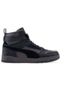 Buty Puma RBD Game Winter 38760407 - czarne. Wysokość cholewki: za kostkę. Zapięcie: rzepy. Kolor: czarny. Materiał: guma, skóra, polar. Szerokość cholewki: normalna. Wzór: paski. Sezon: zima