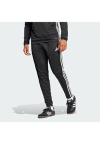 Adidas - adidas Spodnie dresowe Tiro 25 Essentials Training JD0442 Czarny Regular Fit. Kolor: czarny. Materiał: syntetyk #1