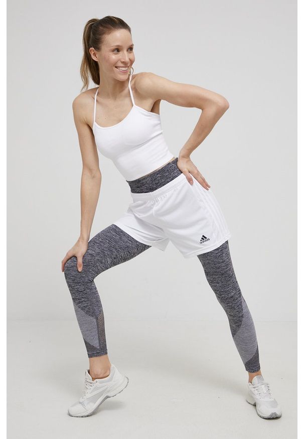 DKNY - Dkny legginsy damskie kolor szary melanżowe. Stan: podwyższony. Kolor: szary. Materiał: dzianina, materiał. Wzór: melanż
