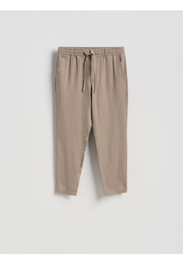 Reserved - Spodnie z lyocellu - brązowy. Kolor: brązowy