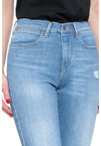 Wrangler - WRANGLER HIGH RISE SKINNY INDIGO BEACHES W27HGU241 112128082. Stan: podwyższony