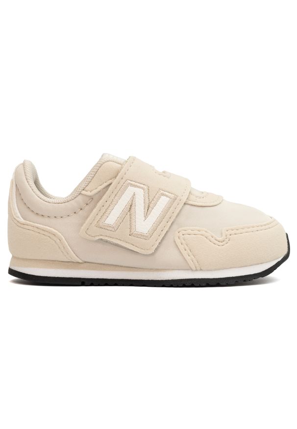 Buty niemowlęce New Balance IV323AC – beżowe. Okazja: na uczelnię, na co dzień. Kolor: beżowy. Materiał: syntetyk, materiał. Szerokość cholewki: normalna