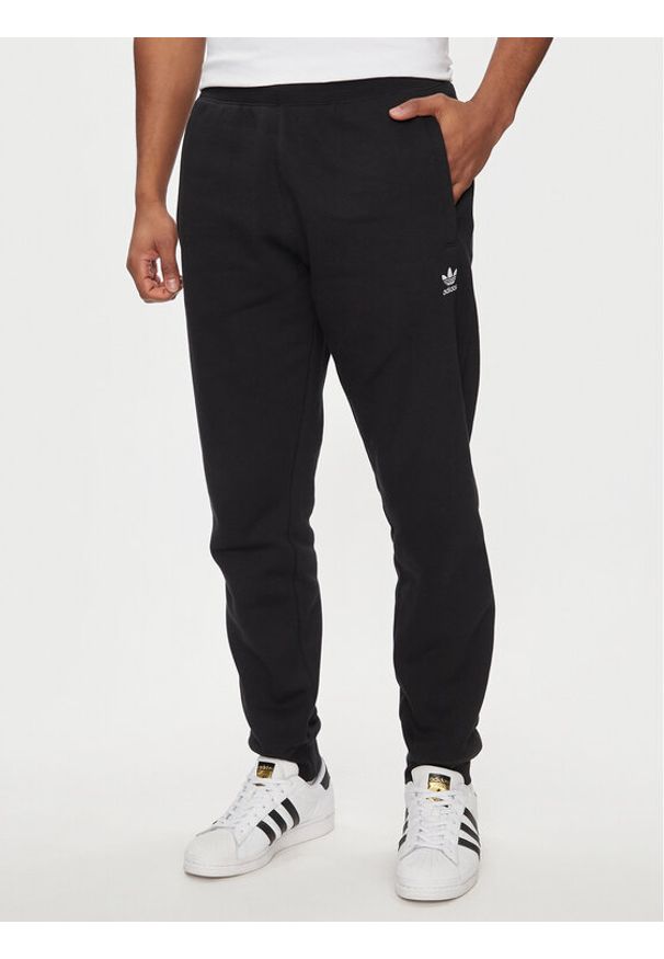 Adidas - adidas Spodnie dresowe Trefoil Essentials IR7798 Czarny Slim Fit. Kolor: czarny. Materiał: syntetyk