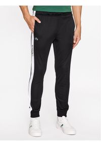 Lacoste Spodnie dresowe XH1798 Czarny Regular Fit. Kolor: czarny. Materiał: dresówka, syntetyk