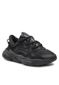 Adidas - Buty adidas Ozweego J EE7775 Cblack/Cblack/Trgrme. Kolor: czarny. Materiał: materiał