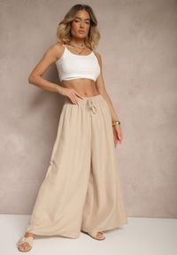 Renee - Beżowe Szerokie Spodnie High Waist Ozdobione Wiązaniem Telonia. Okazja: na co dzień. Stan: podwyższony. Kolor: beżowy. Wzór: aplikacja. Styl: casual, elegancki #5