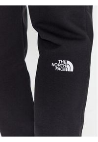 The North Face Spodnie dresowe Essential NF0A7ZJB Czarny Regular Fit. Kolor: czarny. Materiał: bawełna #4