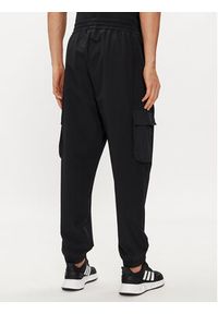 Adidas - adidas Spodnie dresowe City Escape IR5179 Czarny Regular Fit. Kolor: czarny. Materiał: syntetyk #5