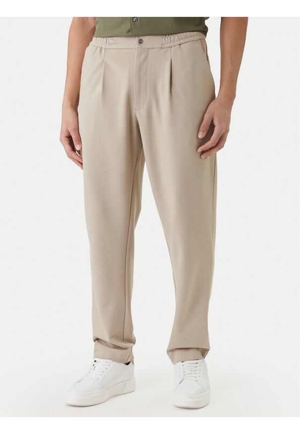 Calvin Klein Spodnie materiałowe LV04LF607G Beżowy Tapered Fit. Kolor: beżowy. Materiał: wiskoza