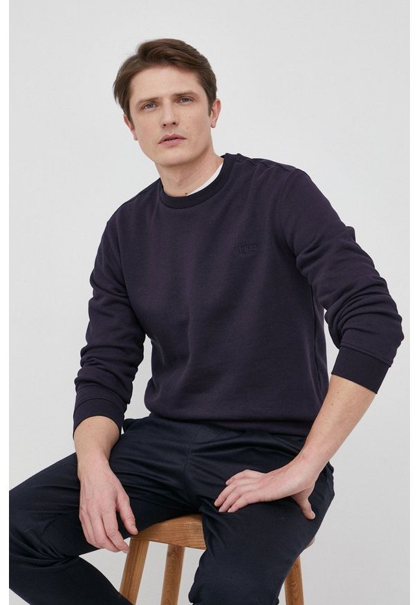 Guess Bluza męska kolor granatowy gładka. Kolor: niebieski. Materiał: bawełna. Wzór: gładki