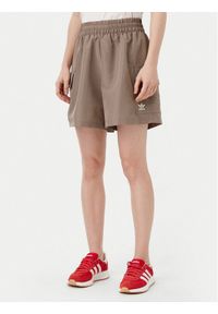 Adidas - adidas Szorty sportowe Essentials Woven JD0790 Beżowy Loose Fit. Kolor: beżowy. Materiał: syntetyk #1