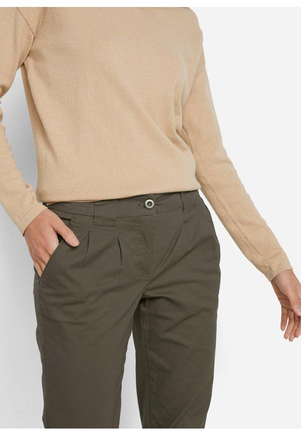 bonprix - Spodnie chino ze stretchem. Okazja: na co dzień. Stan: obniżony. Kolor: zielony. Materiał: bawełna. Wzór: kwiaty. Styl: casual